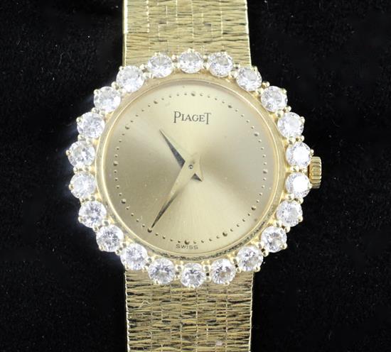 A ladys 1980s 18ct gold and diamond Piaget manual wind wrist watch, with Piaget box.